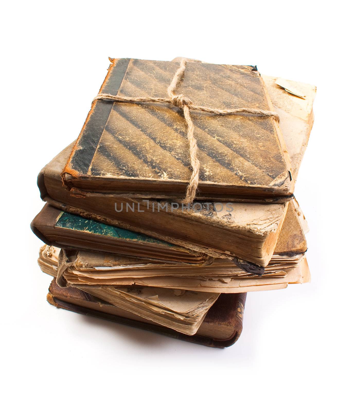 An old book with a crumpled sheet and hardcover isolated on white background