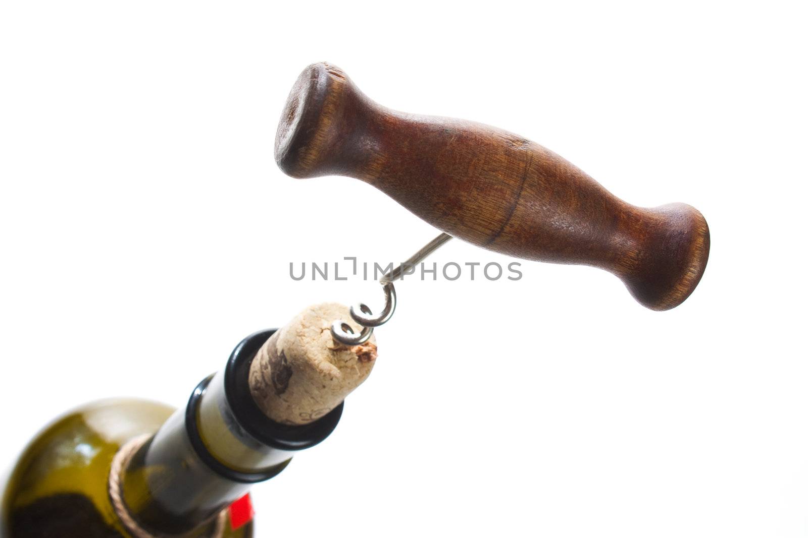 bottle of wine with a corkscrew isolated on white background