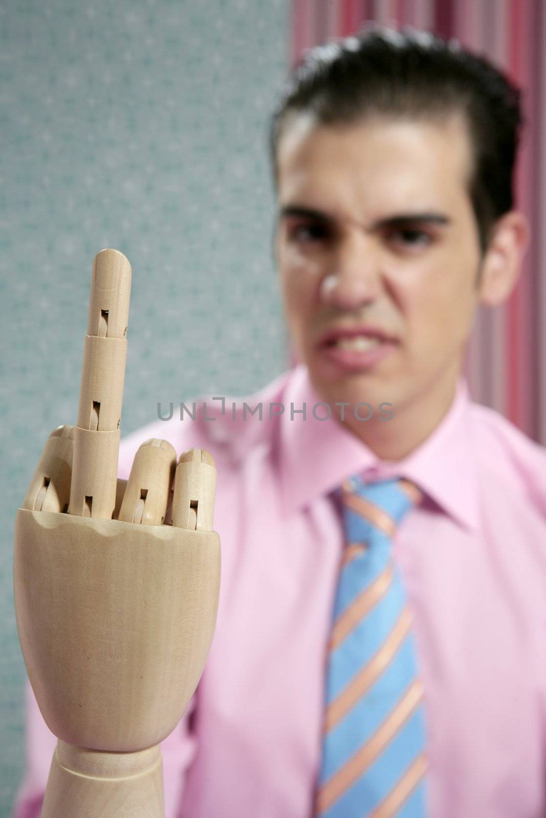 Businessman hand with obscene sign and wallpaper background