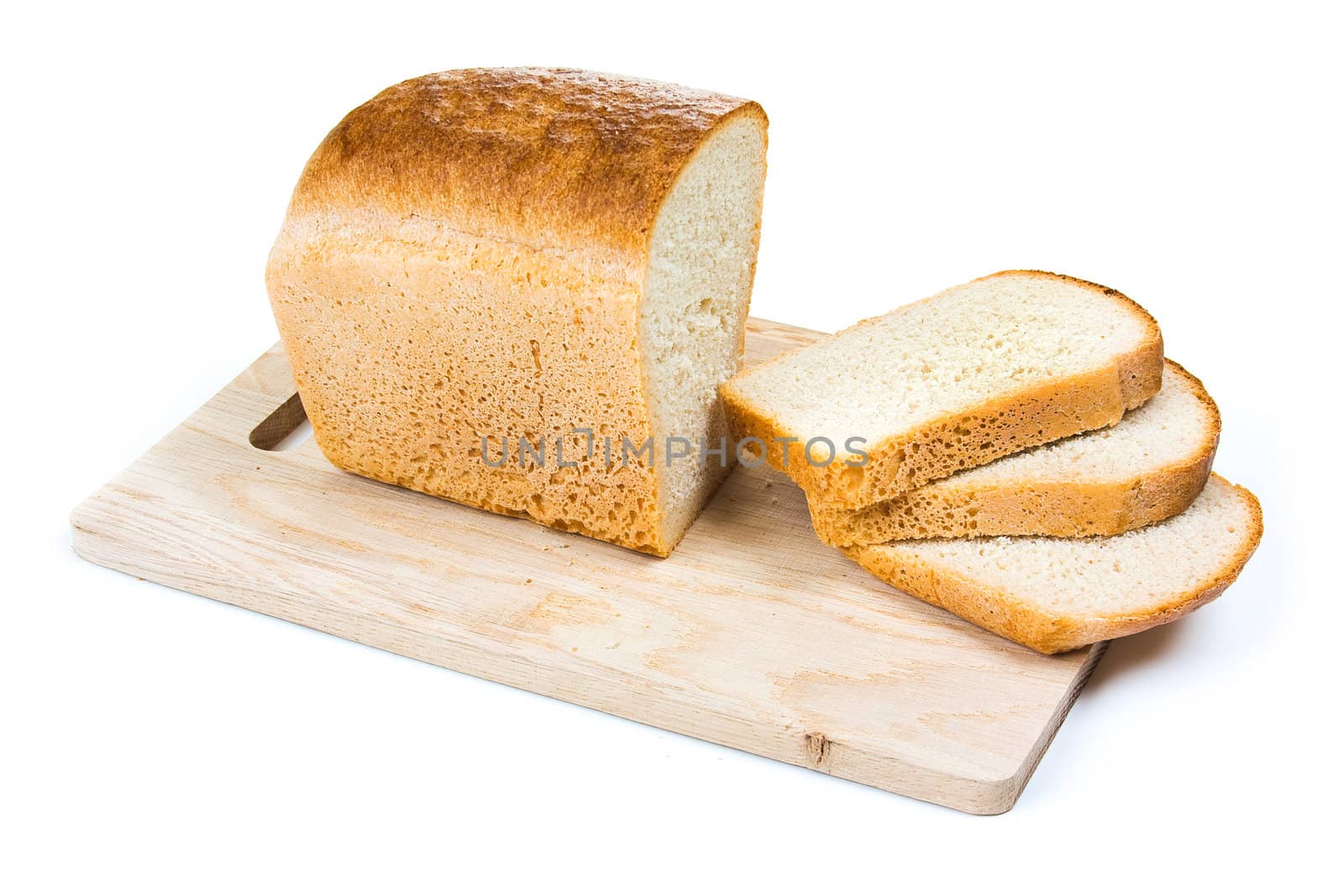 bread on a cutting board by oleg_zhukov