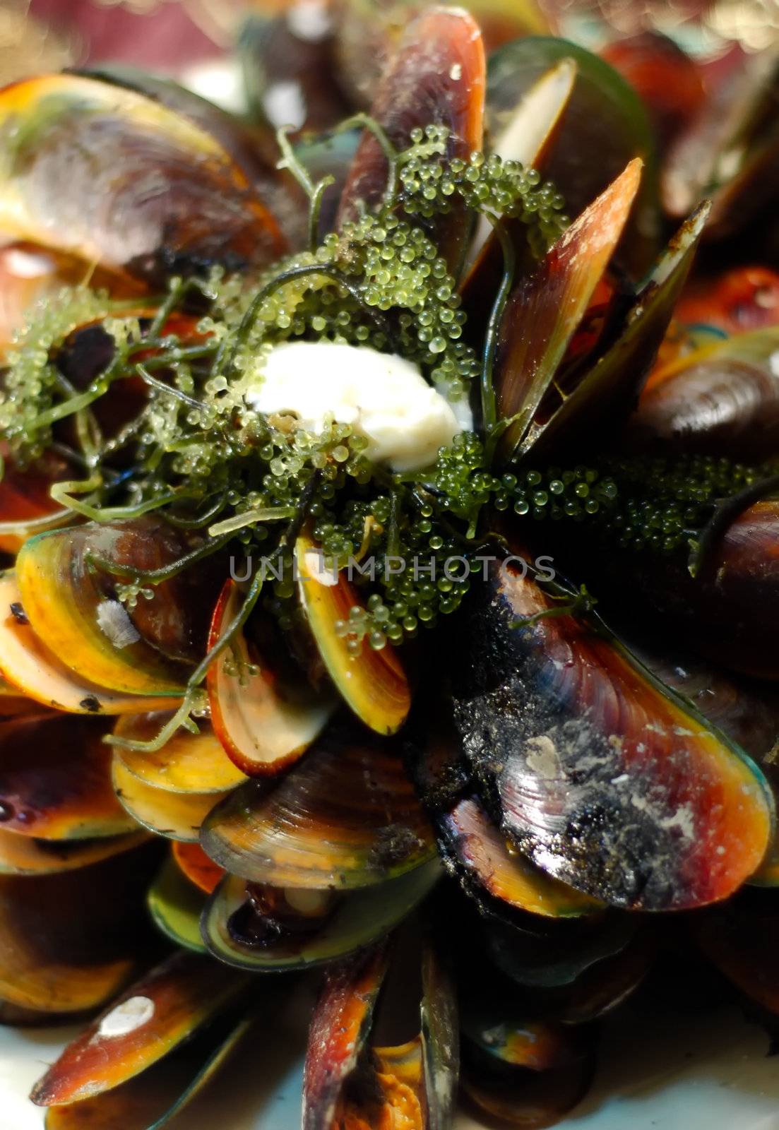 Baked Mussels topped with sea weeds and mayonaisse