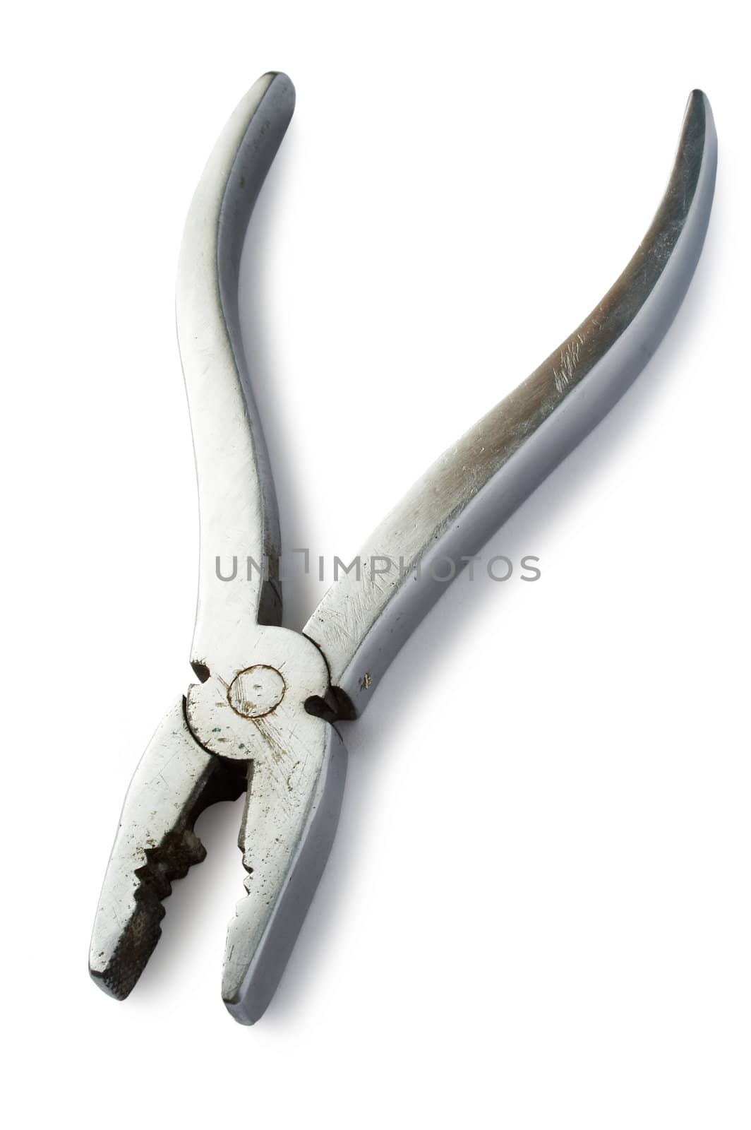 Steel and old pliers on a white background