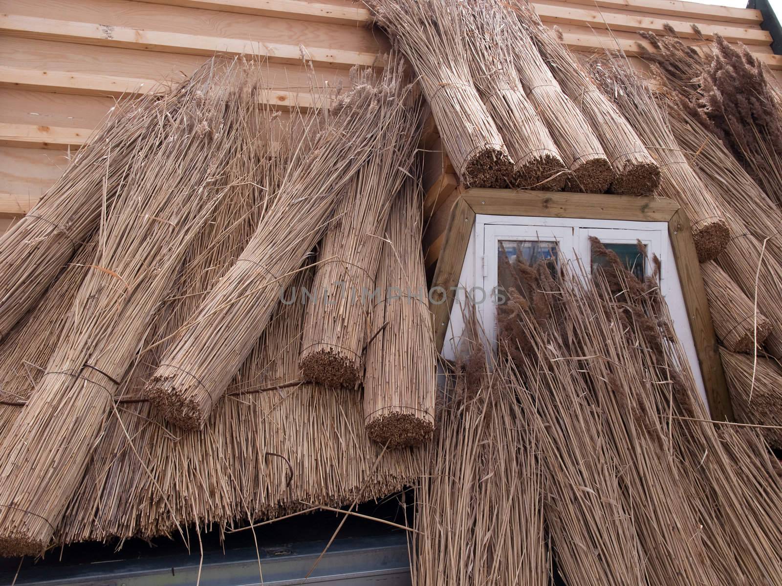 Traditional roofing of a house with  thatched straw hay