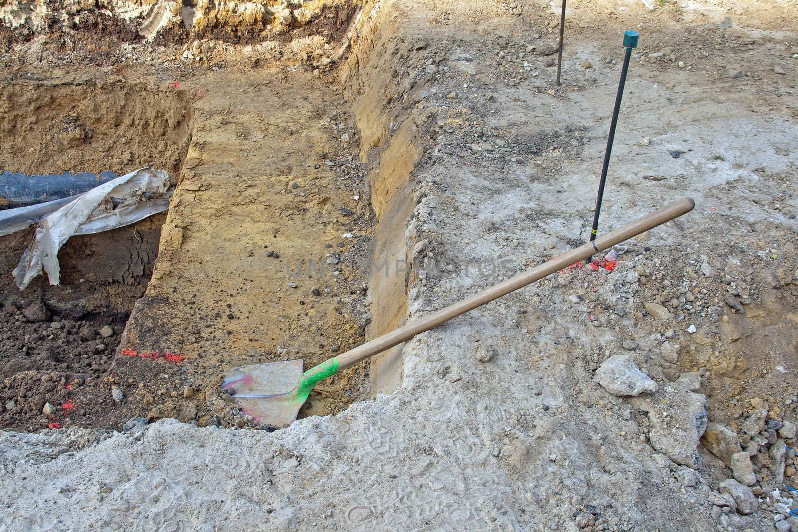 shovel laid on the soil for public works and excavation