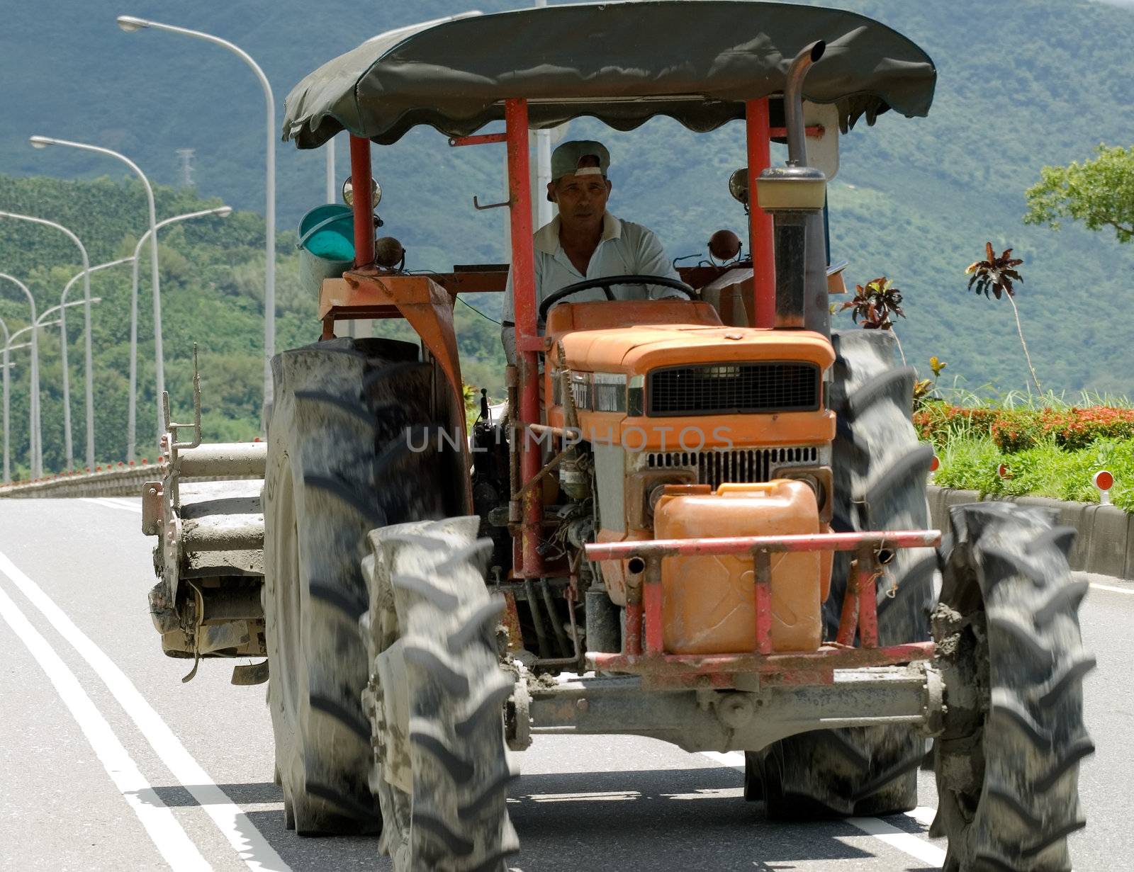 Here is a power tiller on the road.