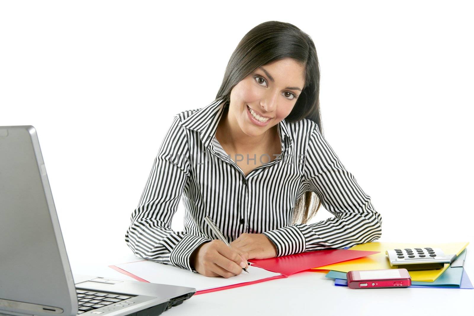 Beautiful secretary businesswoman writing on desk by lunamarina