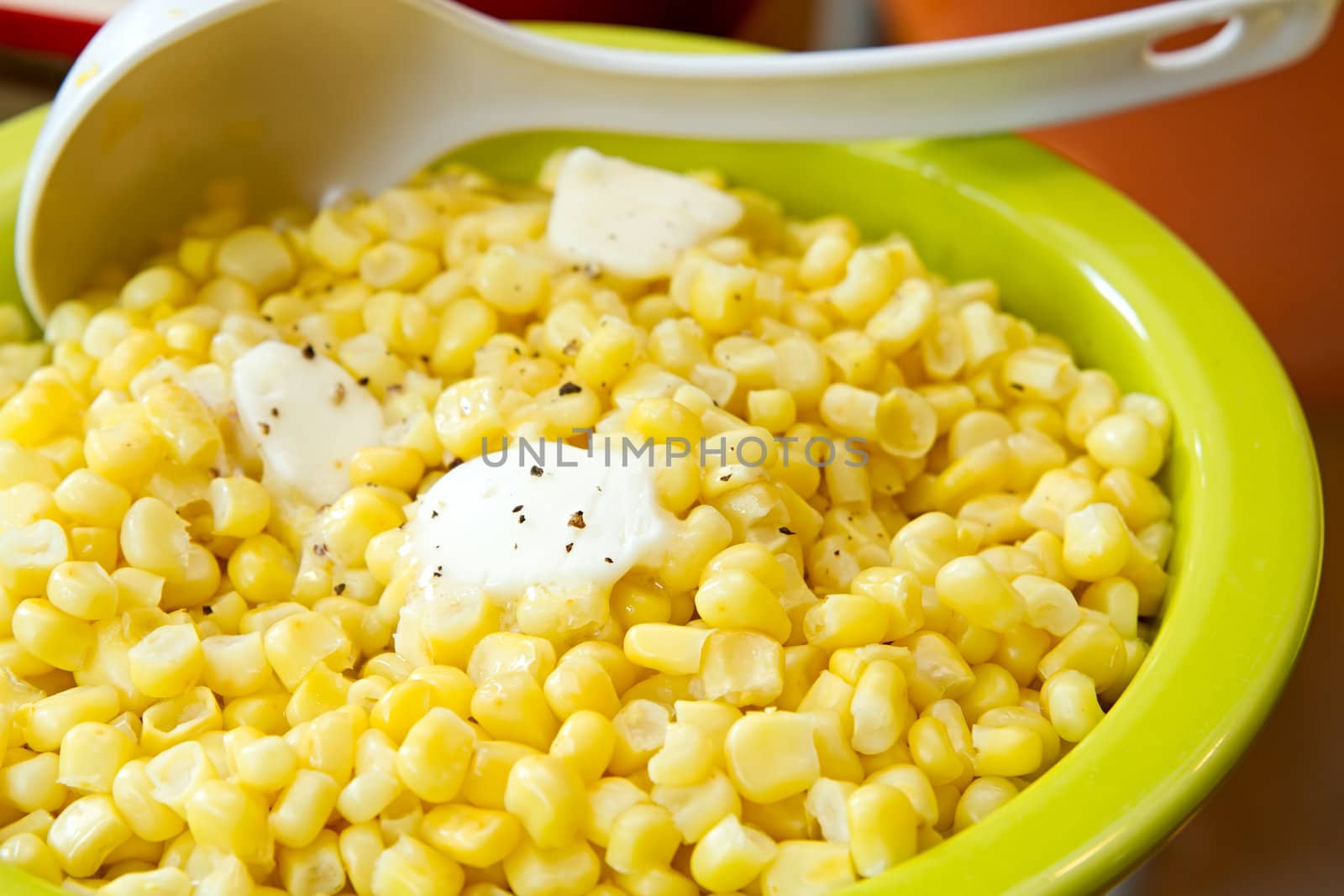 Sweet Corn with Melted Butter and Cracked Pepper Closeup