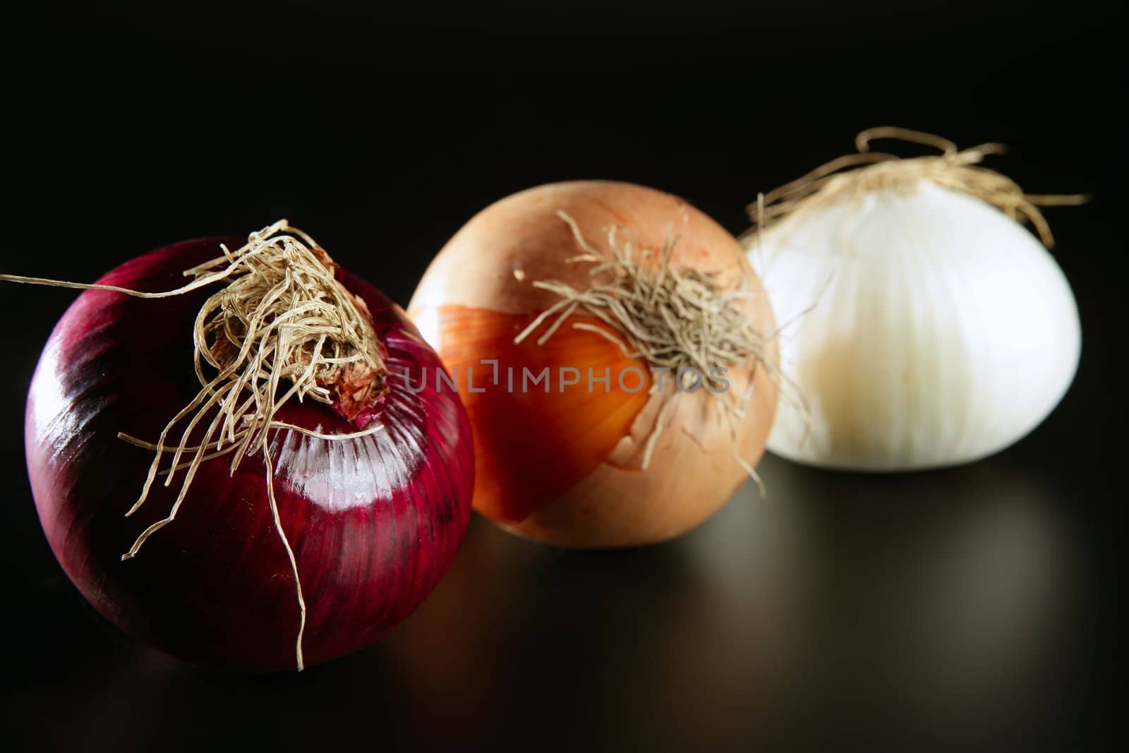 Three colorful different onion by lunamarina