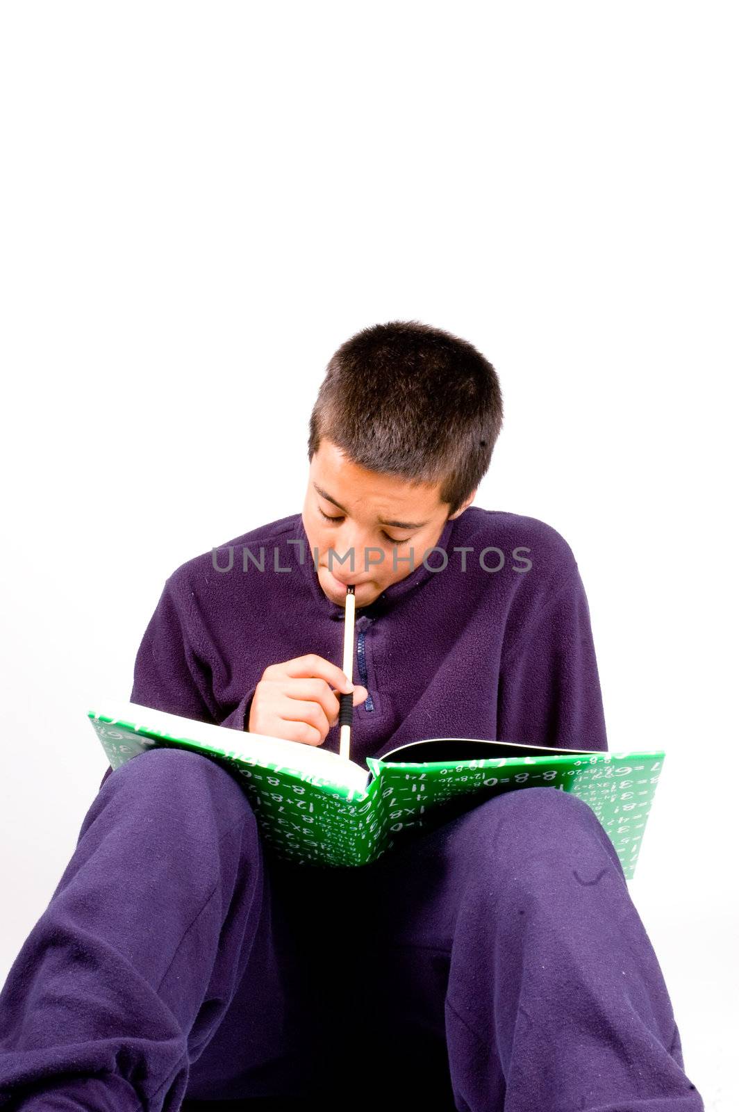 pakistan schoolboy is studying isolated on a white background