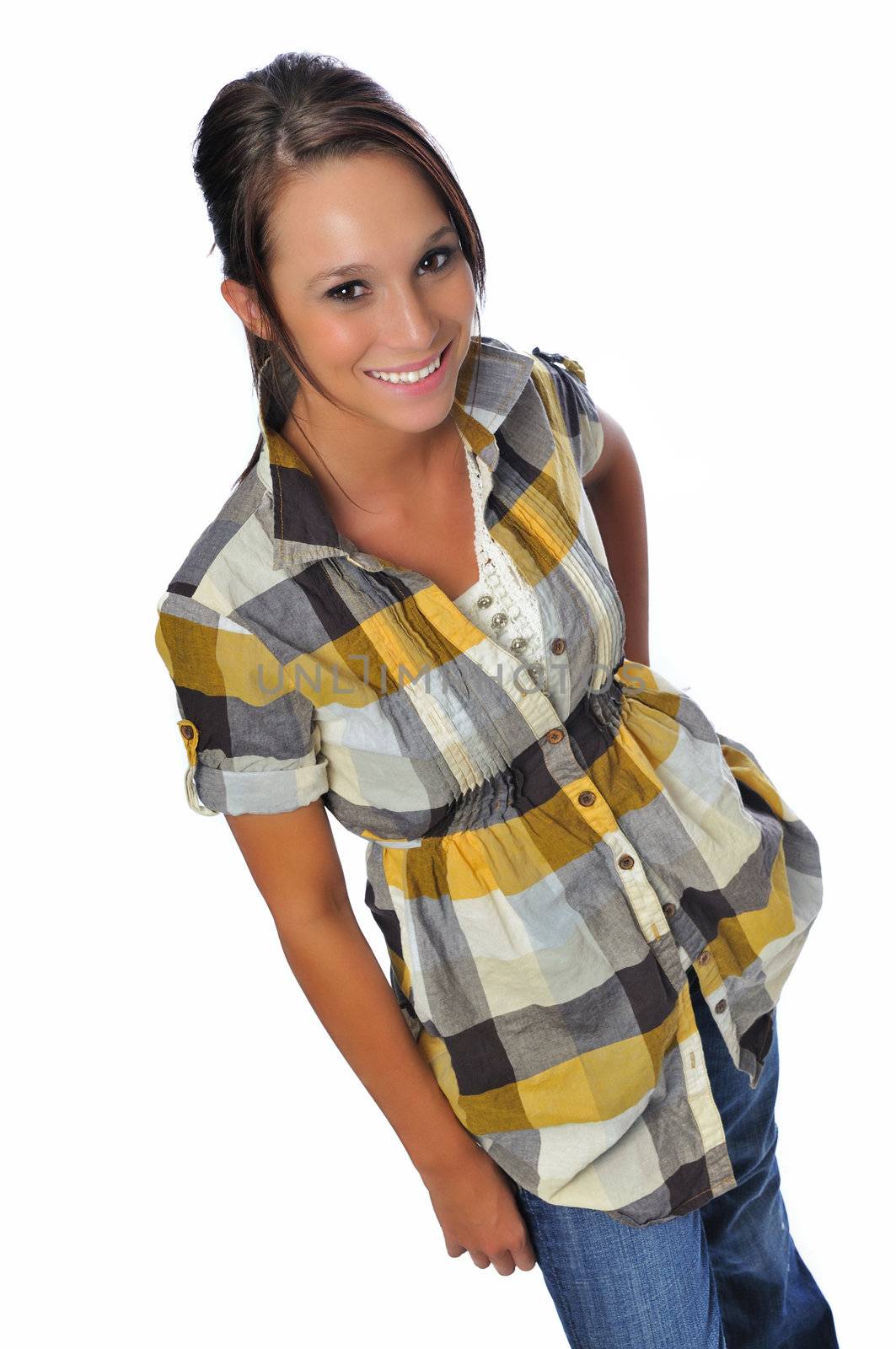 Attractive young woman in a plad shirt and jeans