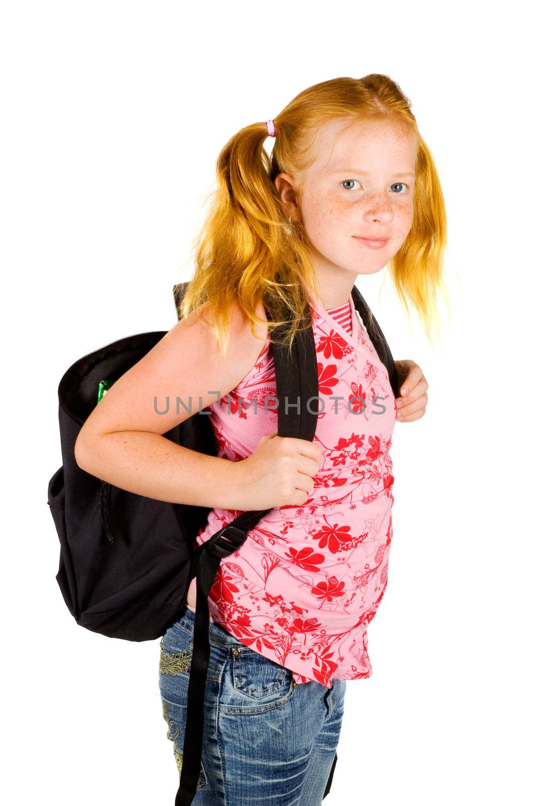 happy schoolgirl ready to go to school isolated on white