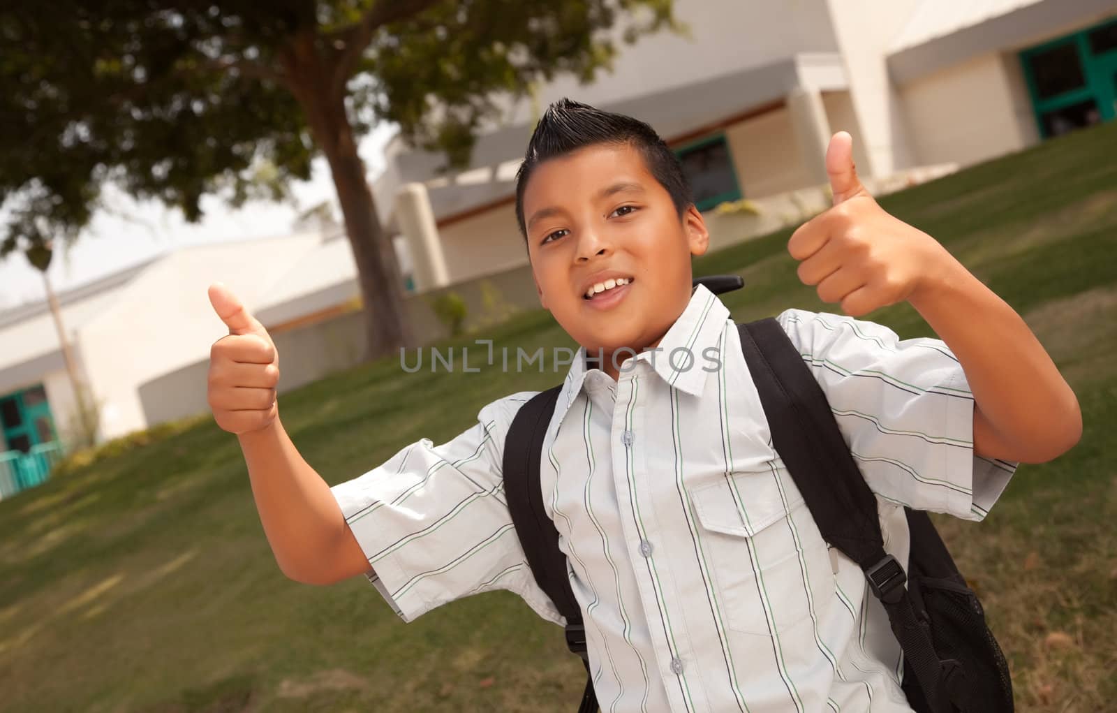 Happy Young Hispanic Boy Ready for School by Feverpitched