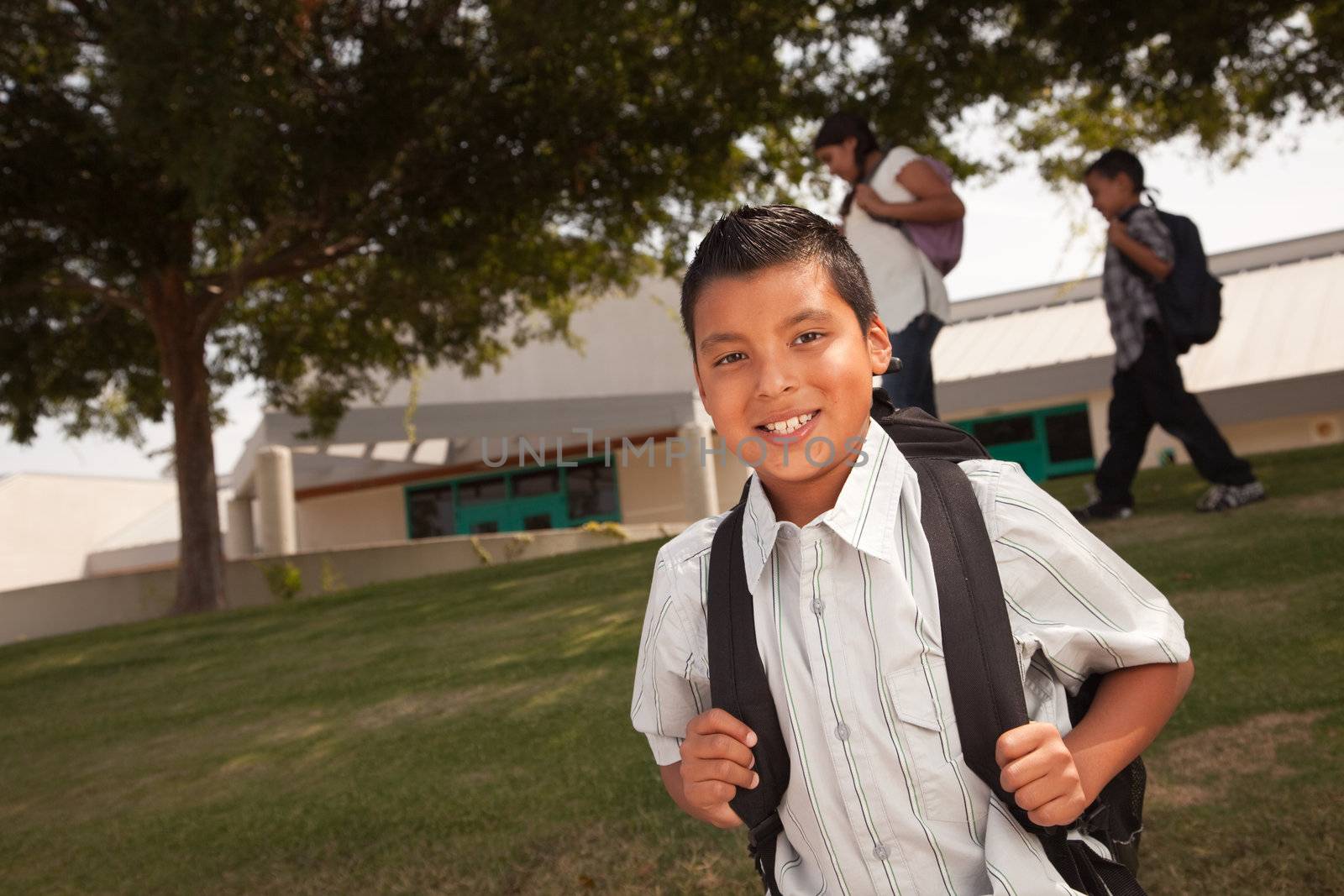 Happy Young Hispanic Boy with Backpack Ready for School.