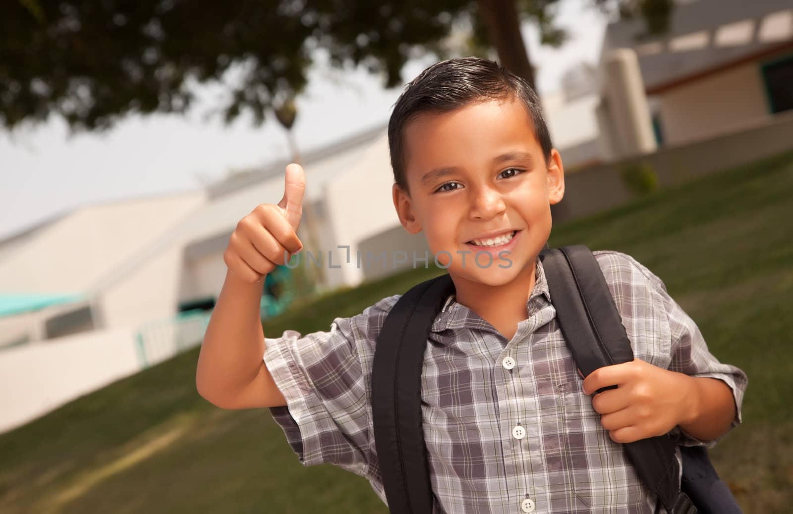 Happy Young Hispanic Boy Ready for School by Feverpitched