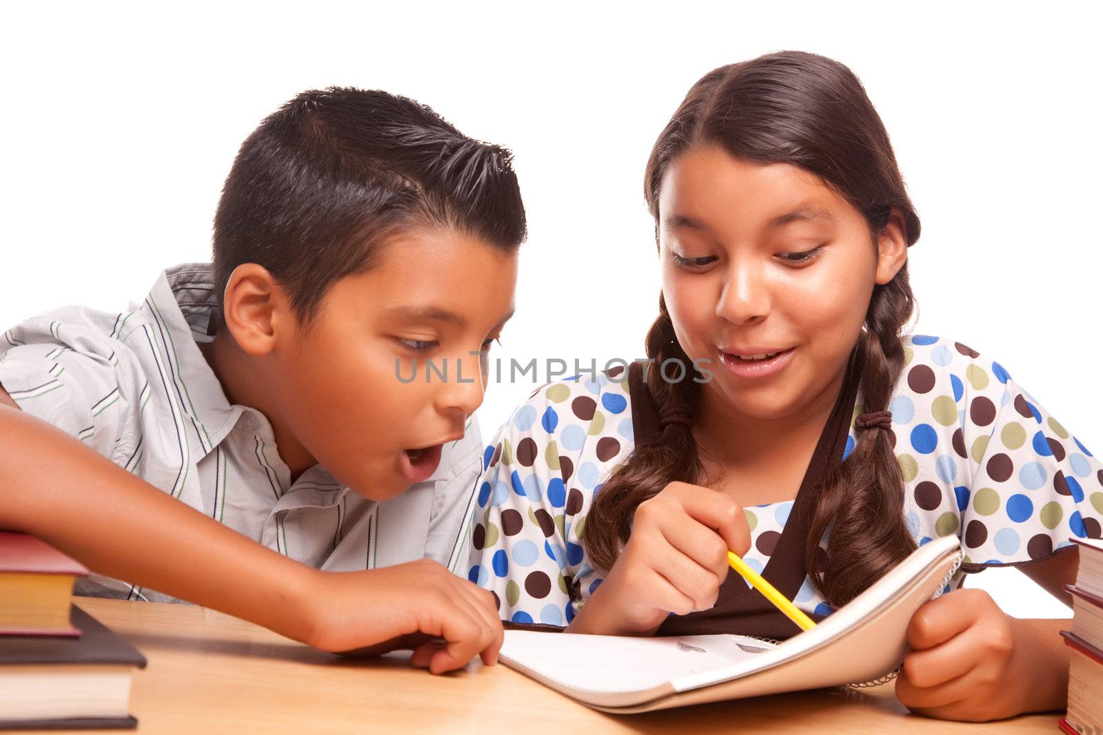 Hispanic Brother and Sister Having Fun Studying Together Isolated on a White Background.