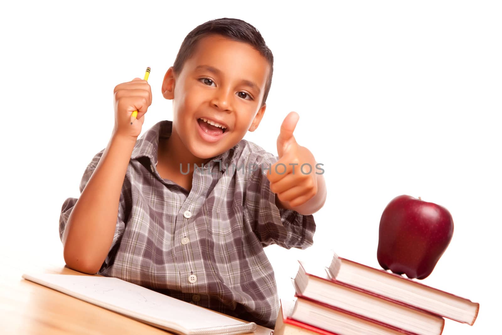 Adorable Hispanic Boy with Books, Apple, Pencil and Paper by Feverpitched