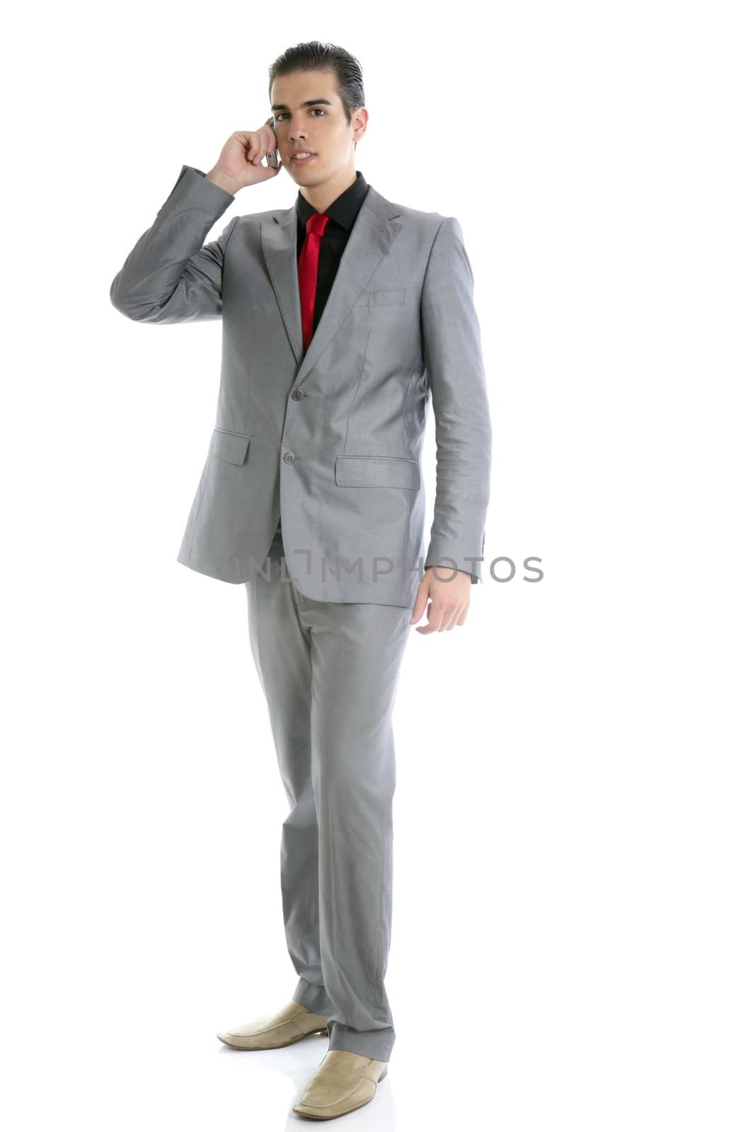Businessman young full body talking phone isolated on white