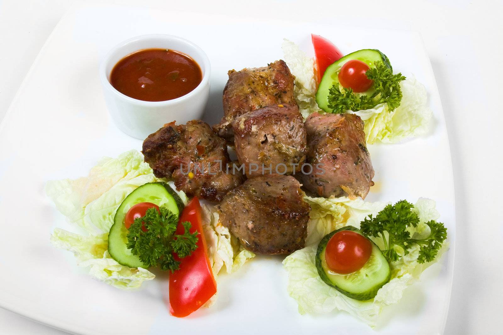 dishes of roast meat with spice
