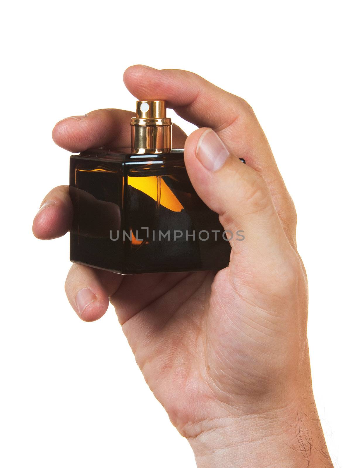 bottle of cologne in his hand isolated on a white background