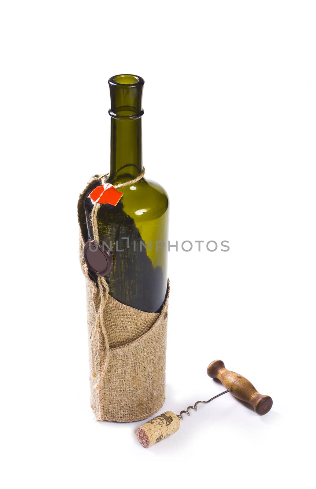 bottle with a stopper and a corkscrew isolated on white background