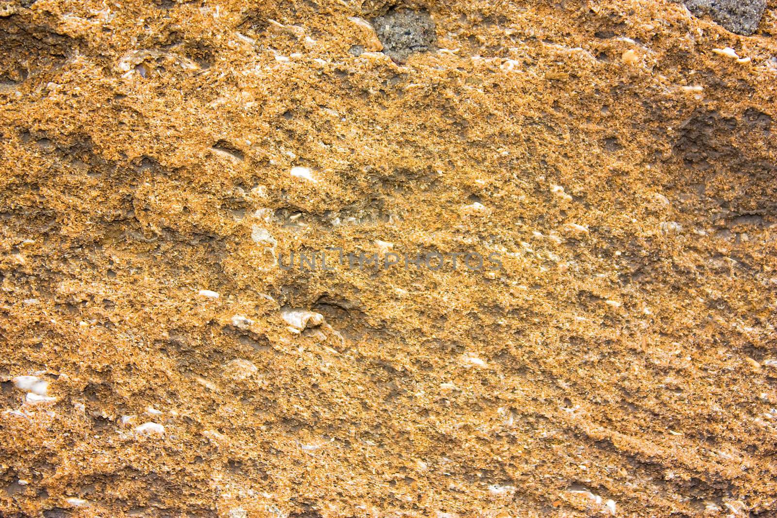 texture of the stone with an ancient excavations