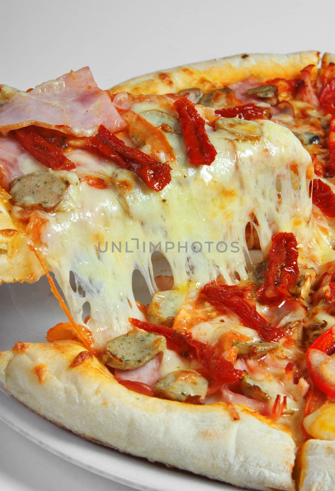 pizza with ham and sausage