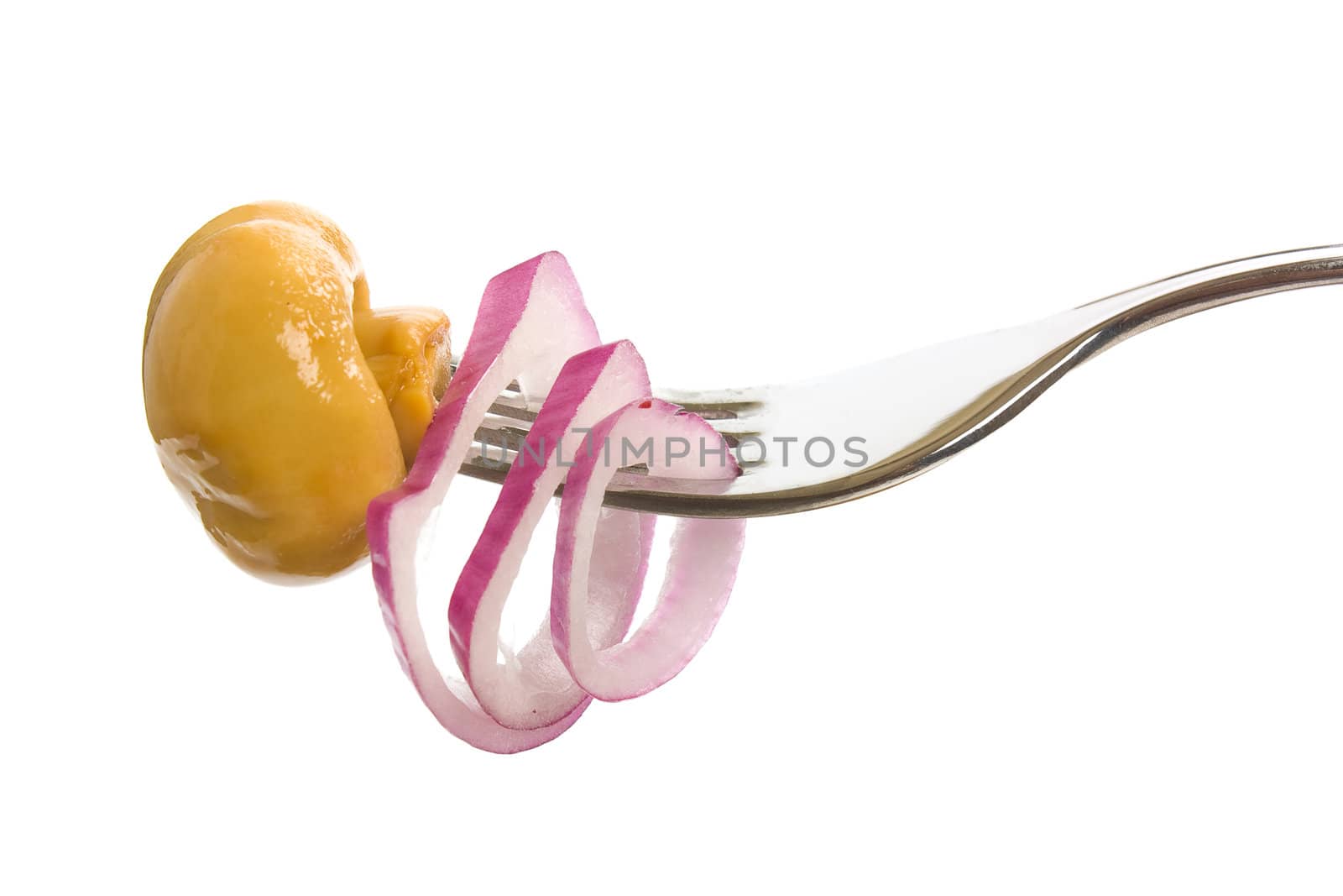 mushroom on a fork isolated on white background