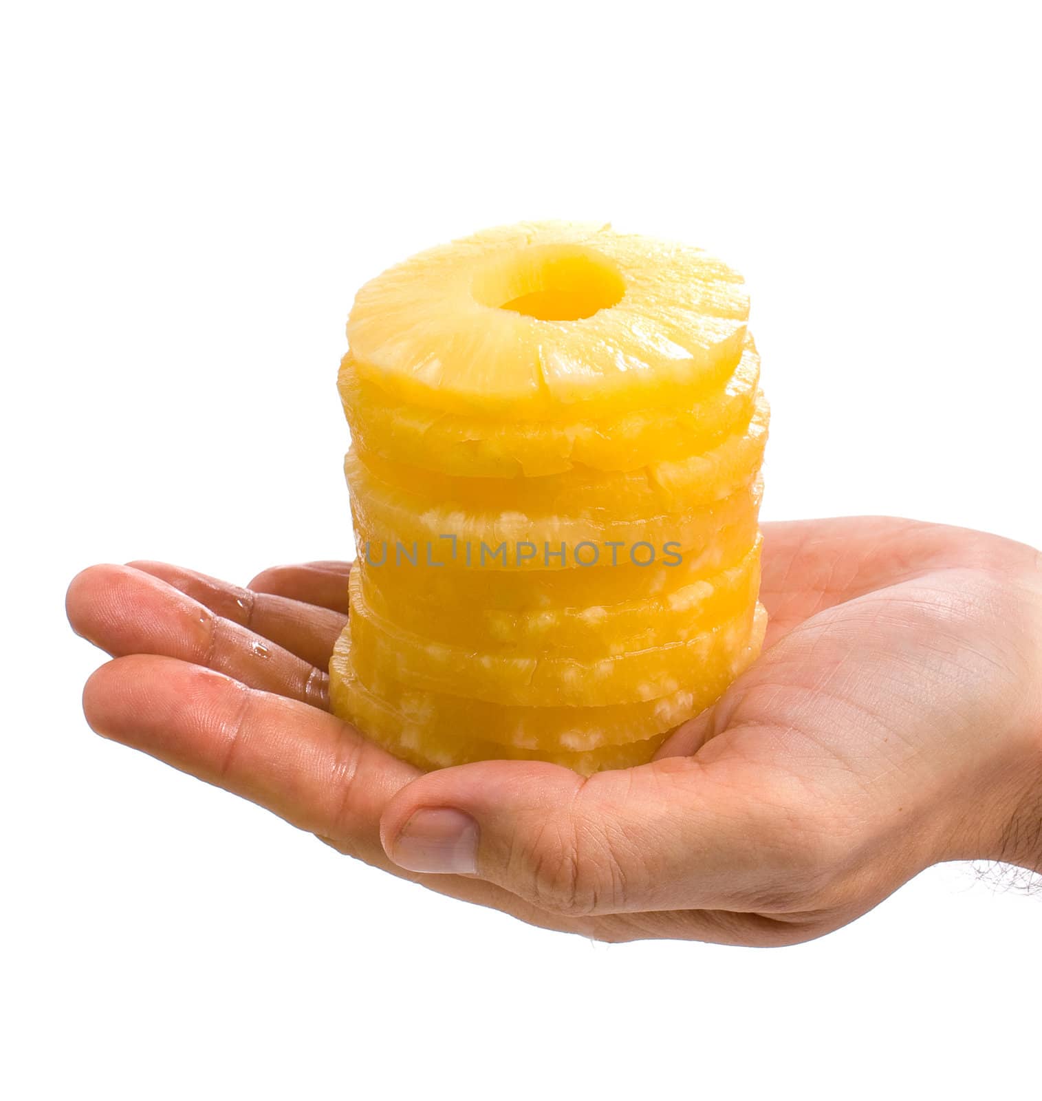 pineapple ring in hand by oleg_zhukov