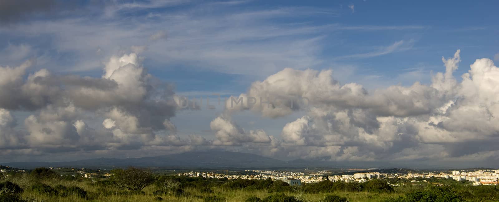 A cloudscape over the town of Lagos, in the Algarve, Portugal.
