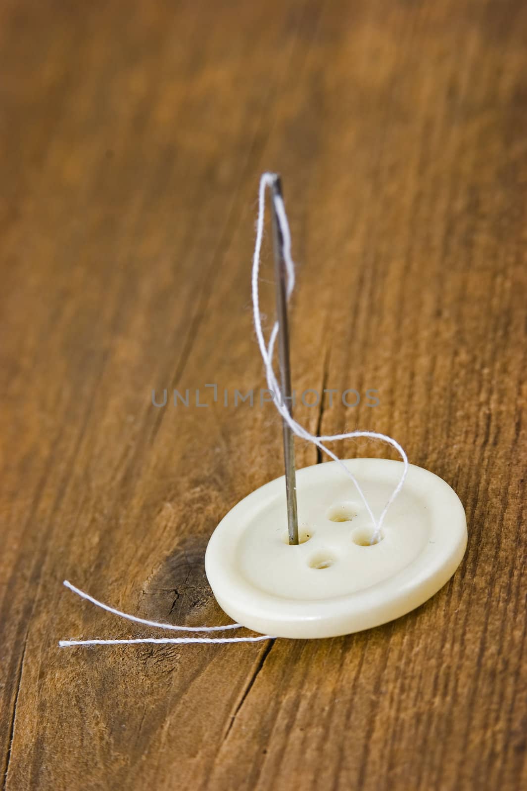 Buttons with needle and thread by oleg_zhukov