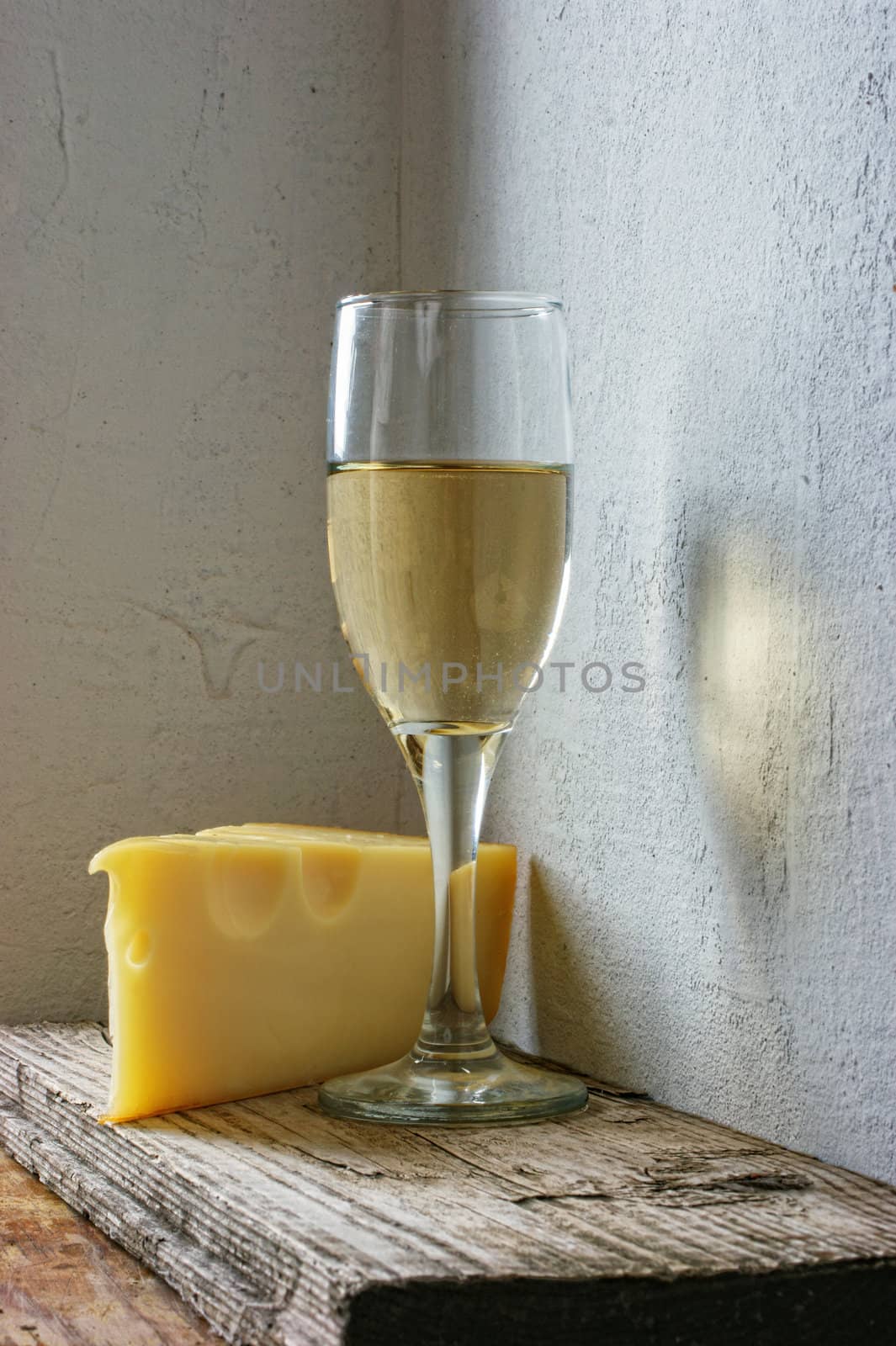 A glass of wine and cheese  by oleg_zhukov