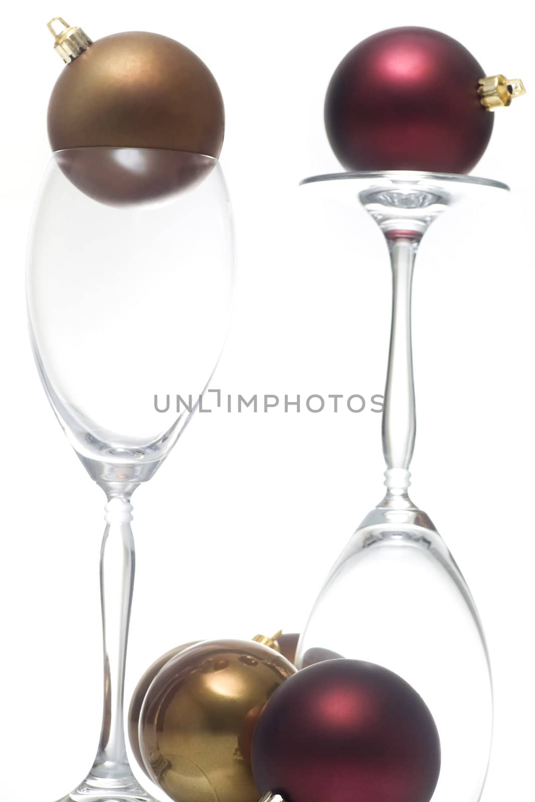 Christmas ornament on two champagne glasses by woodygraphs