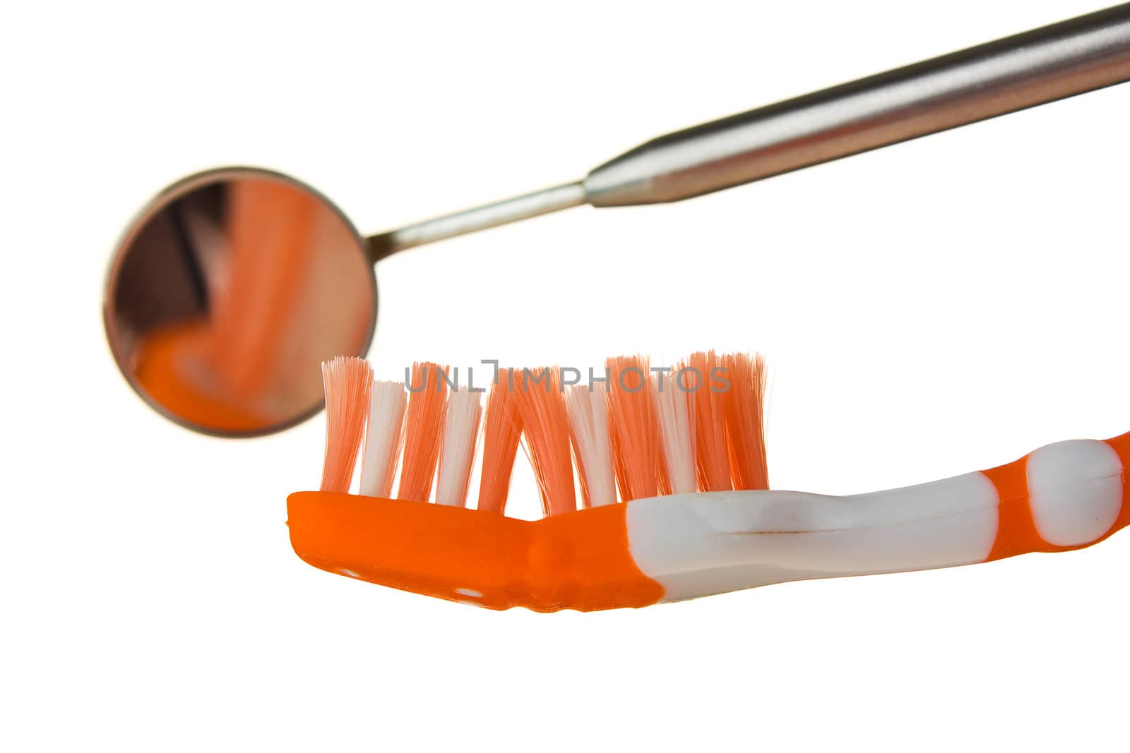 toothbrush and dental tools isolated on white background