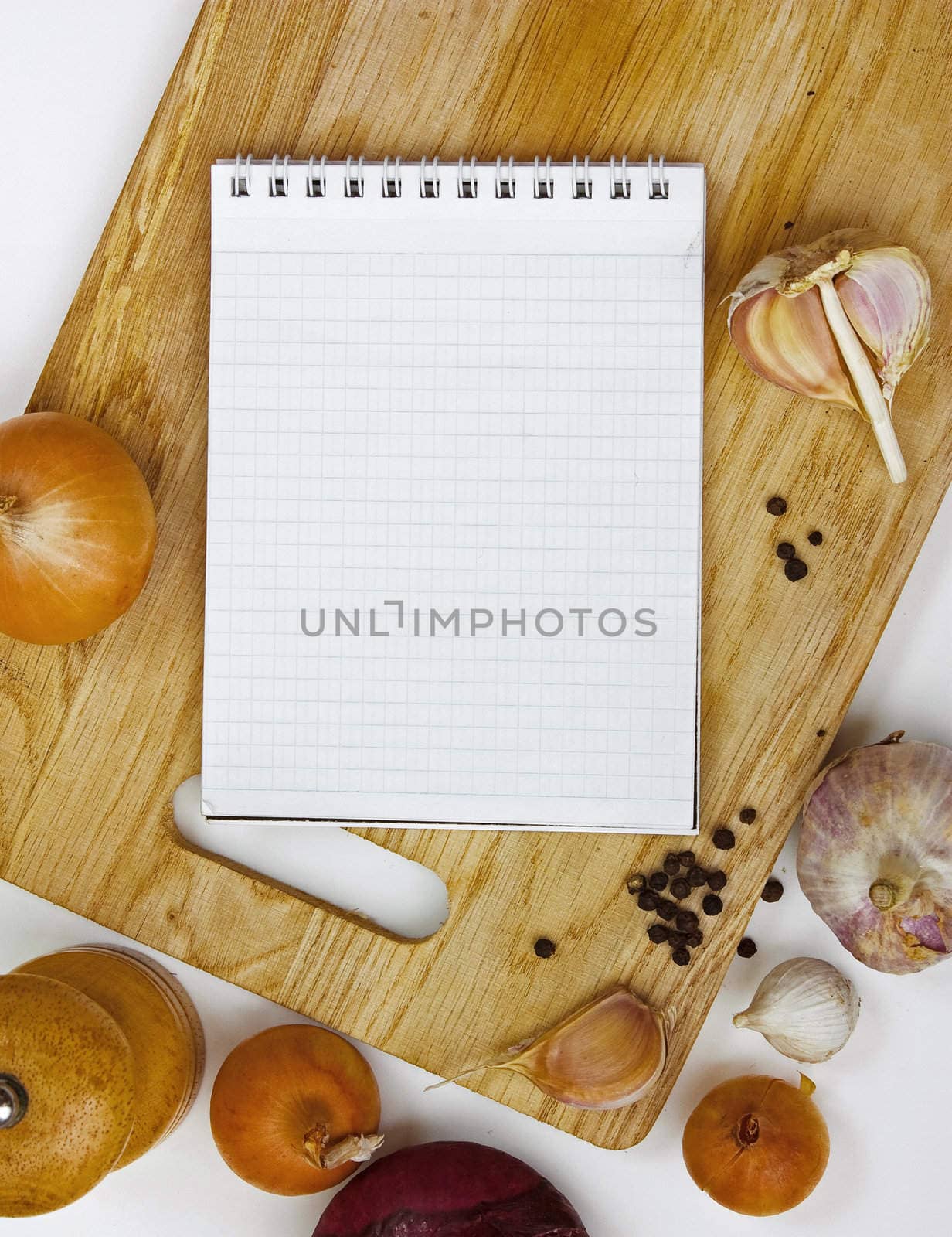 notebook for culinary notes on a cutting board