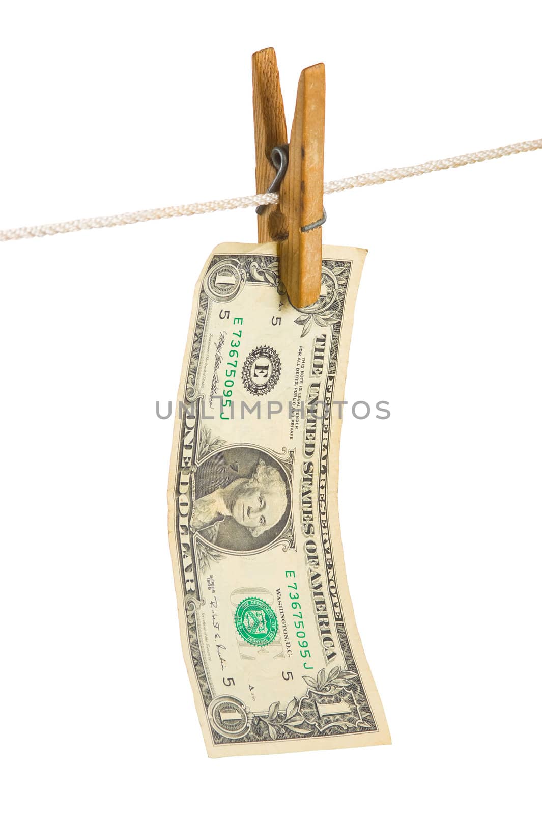 Dollars on clothespin by oleg_zhukov