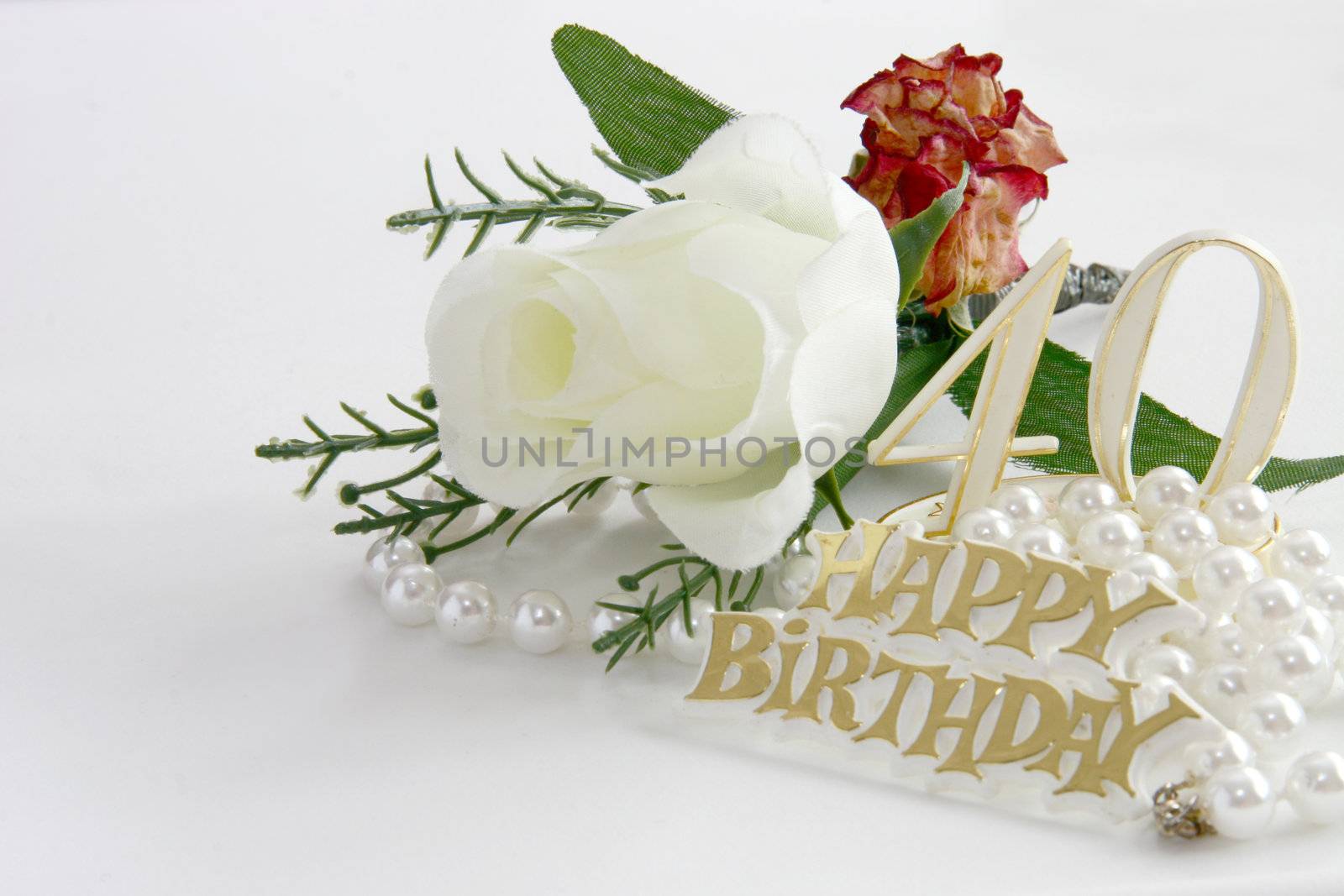 40th  birthday sign with pearls and silk rose, a celebratory concept