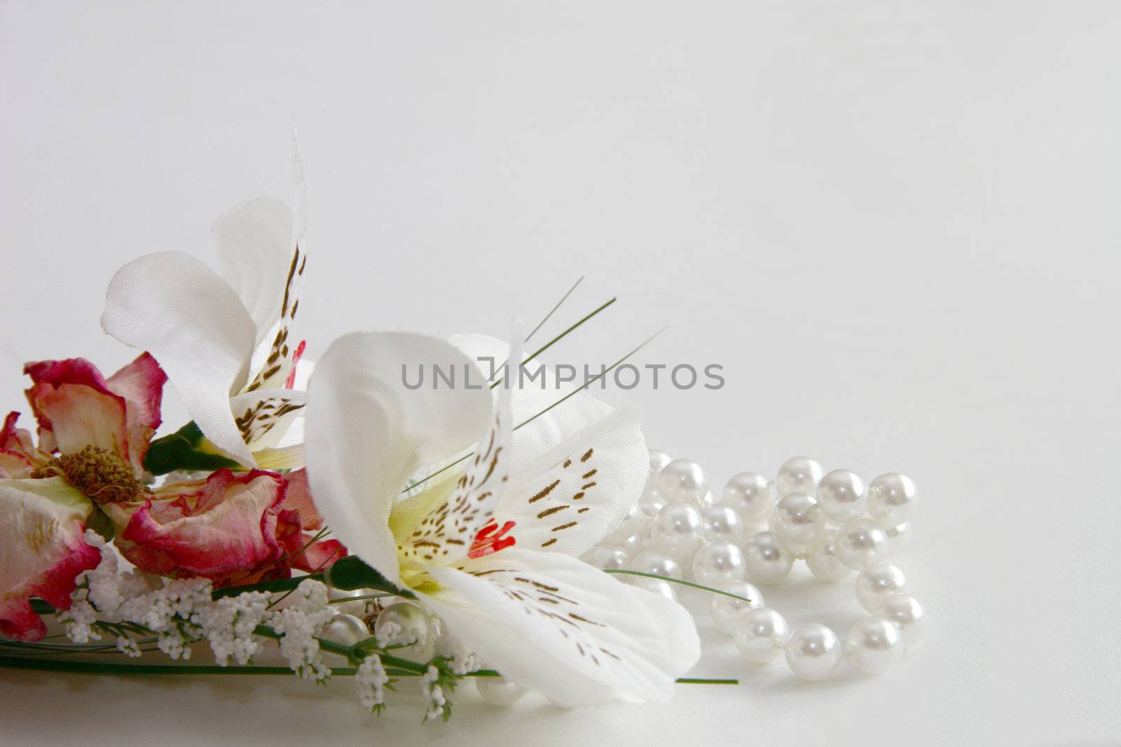 pearl necklace and silk flowers by leafy