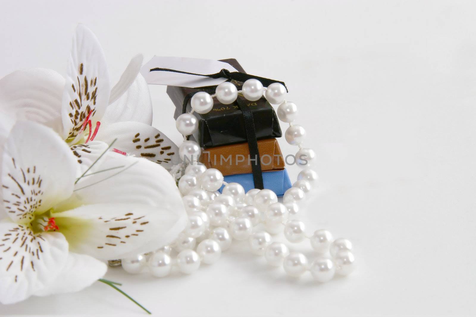 chocs and flowers with pearls by leafy