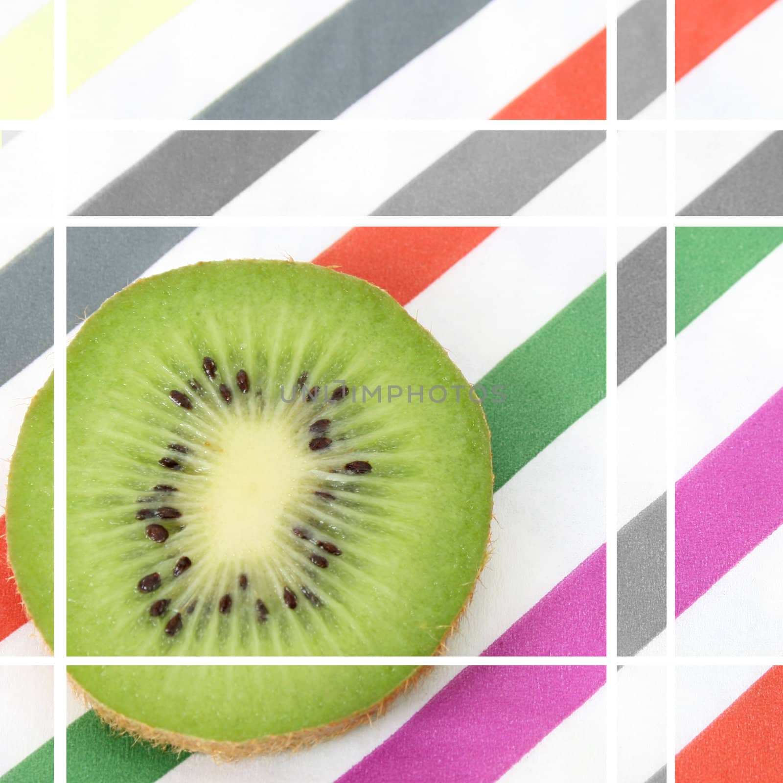 Slice of fresh Kiwi on a striped serviette