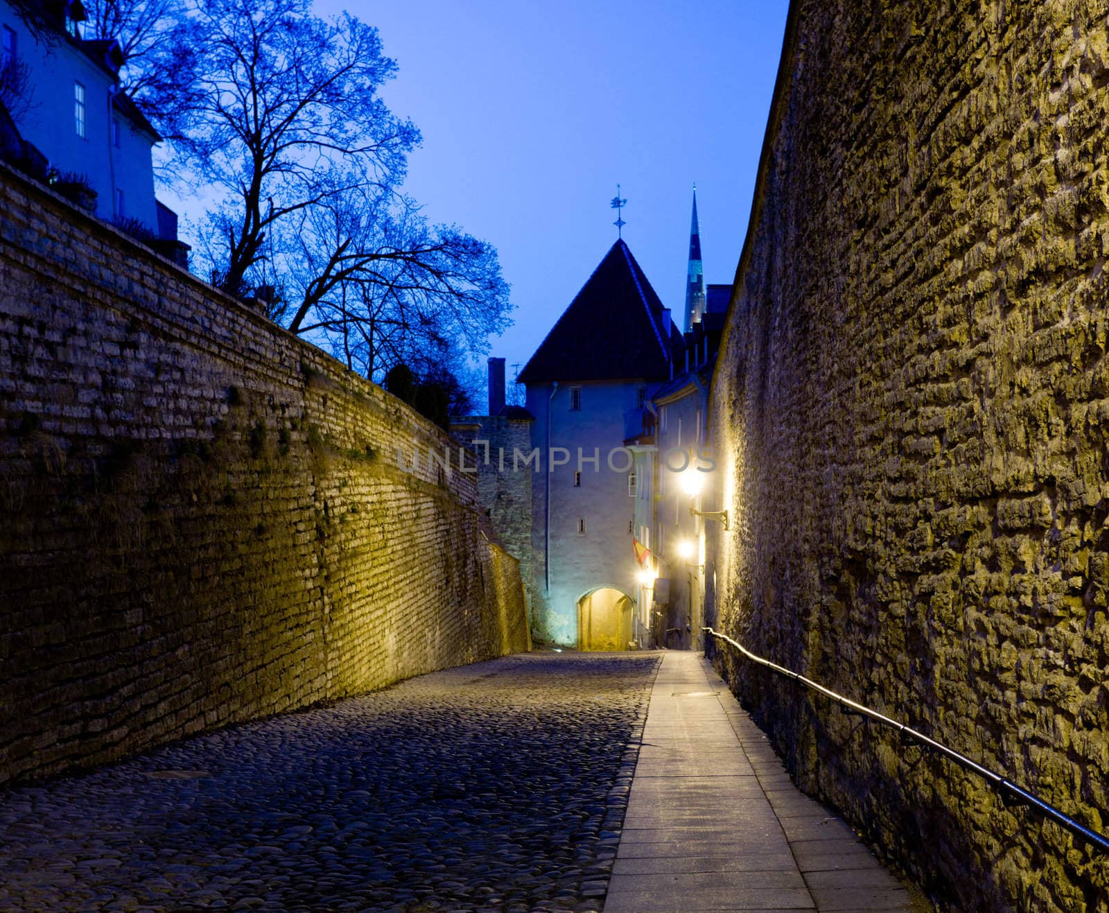 Cobbled street leaving Toompea area of Tallinn in Estonia at dusk