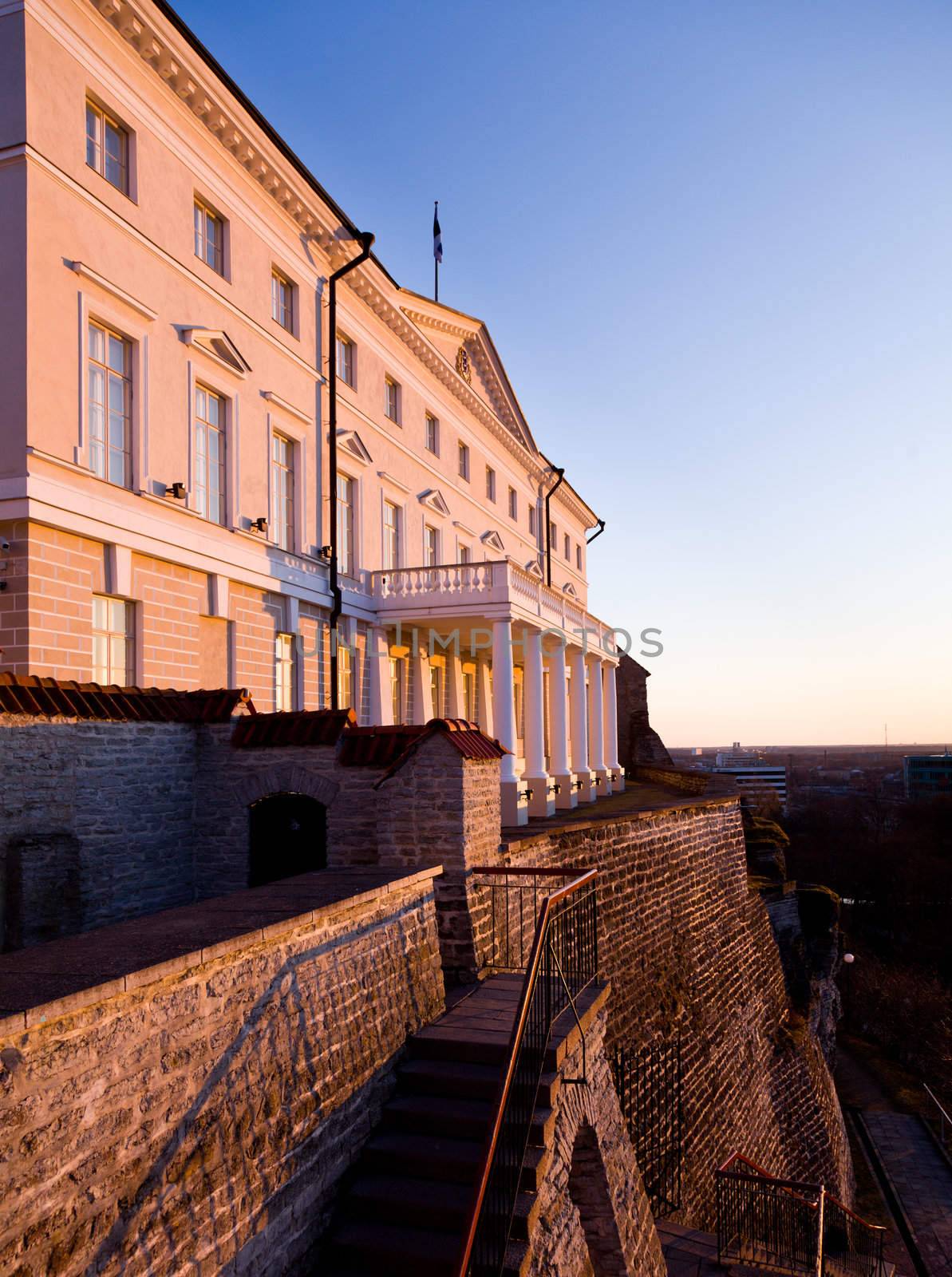 Government building above the town walls in Tallinn as the sun is setting