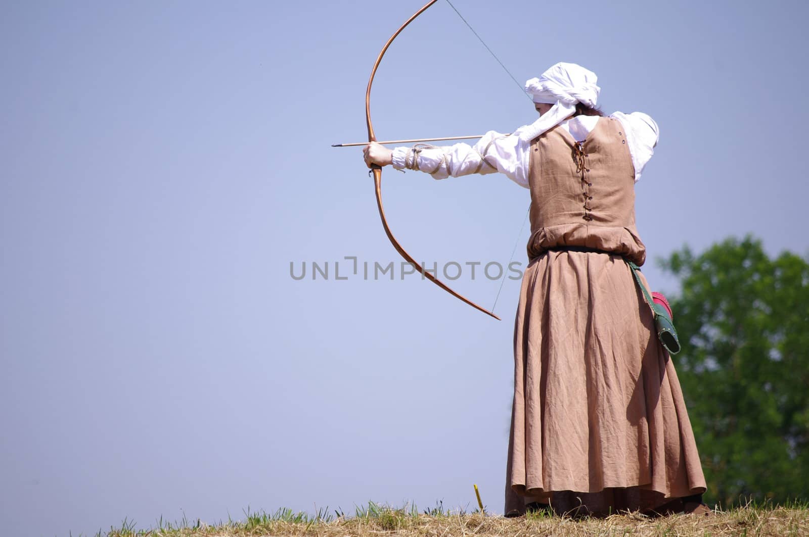 an archer is launching the arrow