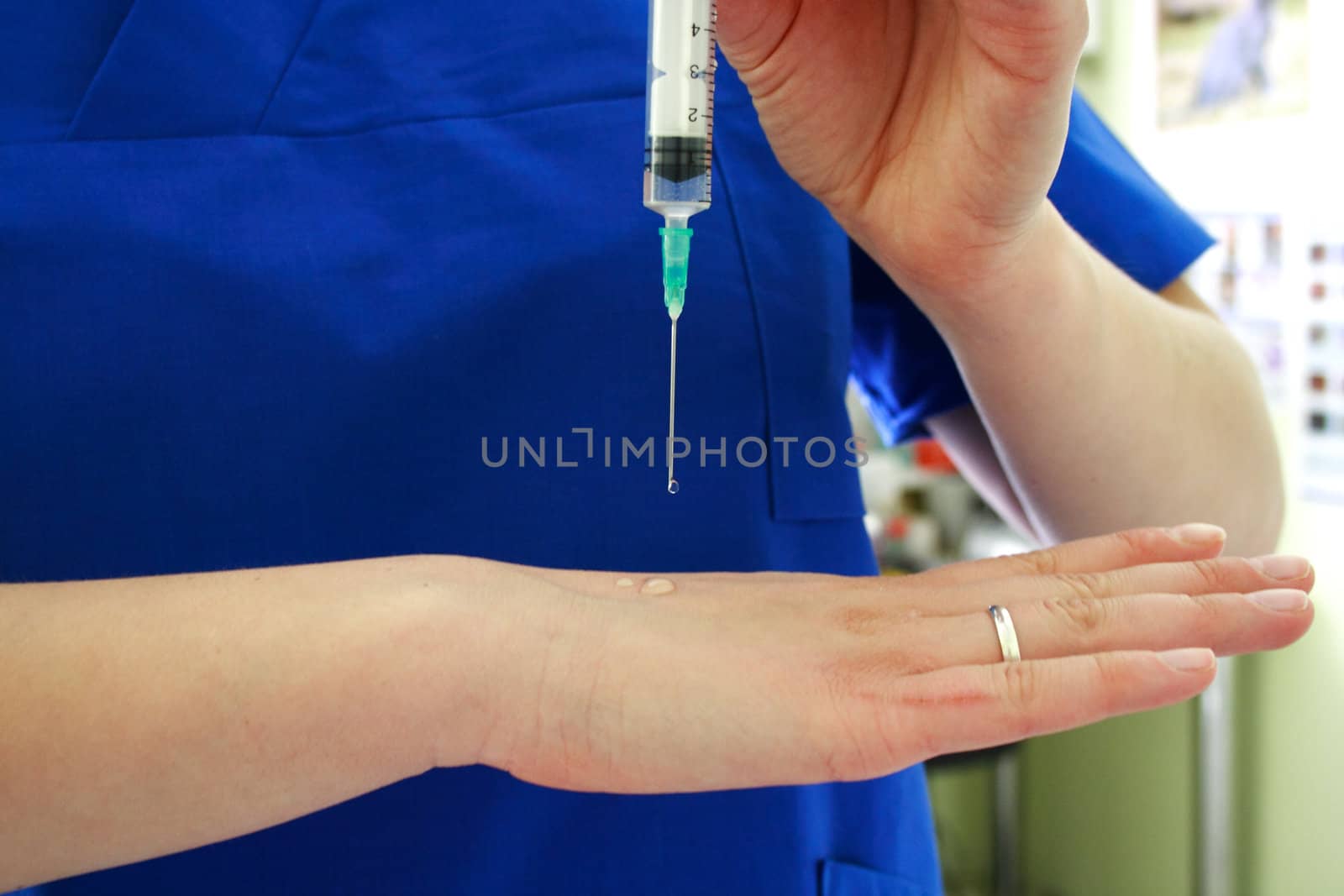 Vaccination concept. Nurse is holding syringe in hand