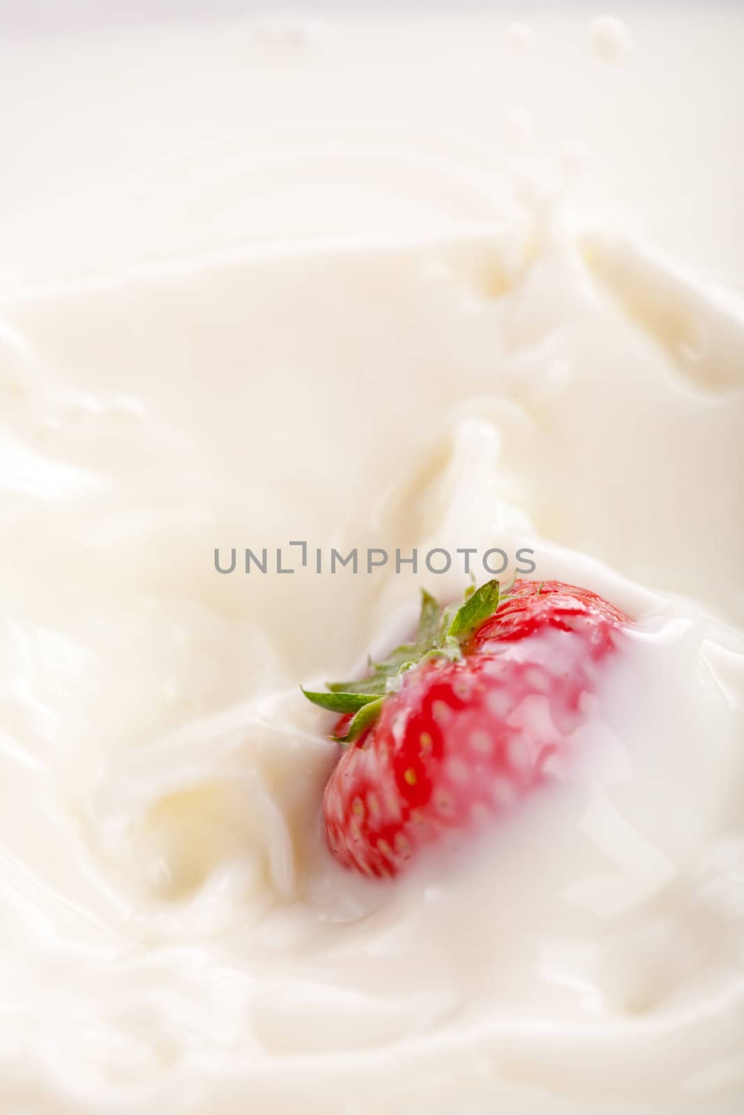 Strawberry in milk (some movement in strawberry due to falling)