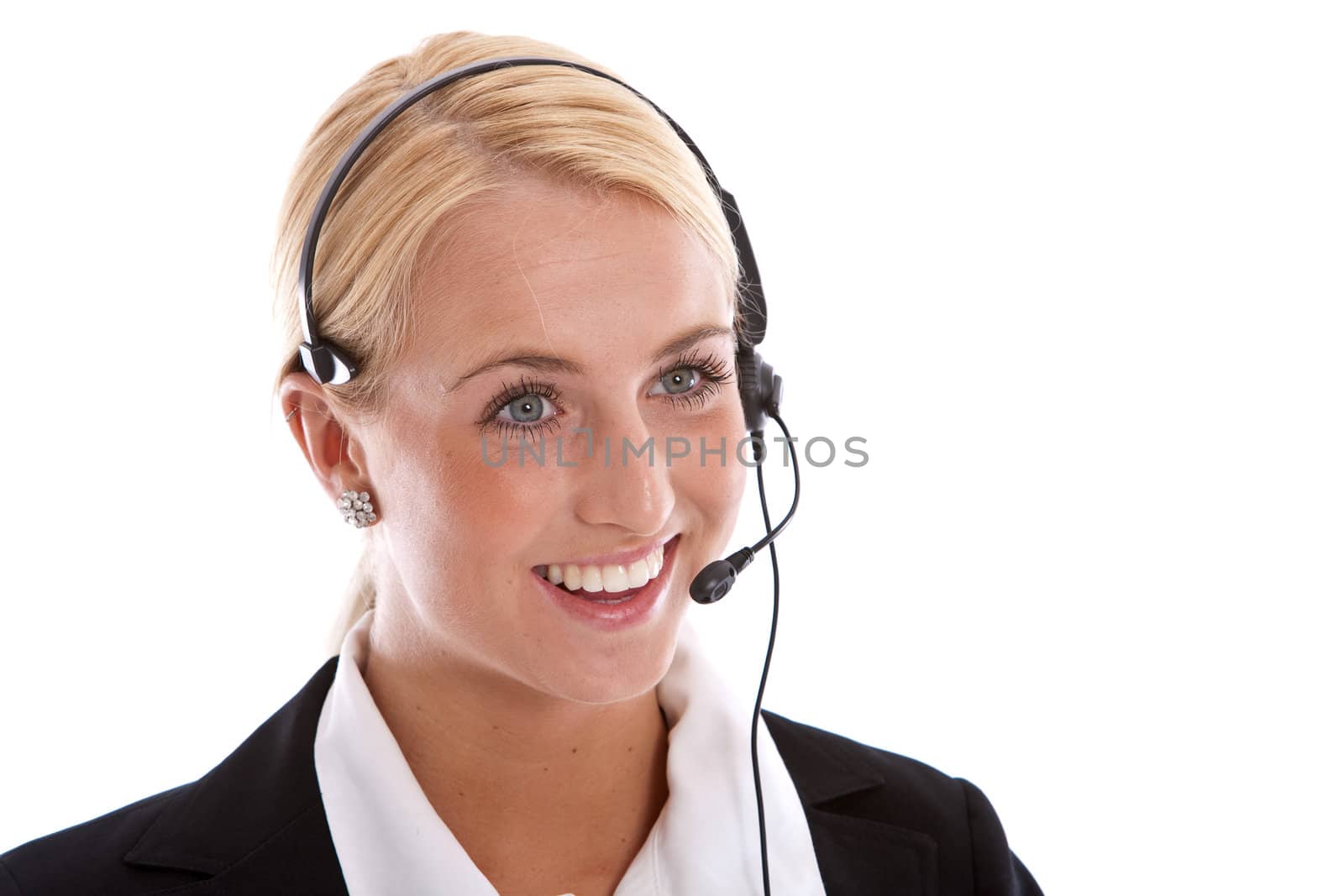 Attractive young woman with receptionist headset and a radiant smile