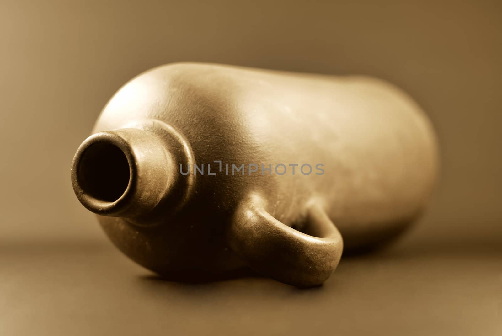 An old flask sepia photo