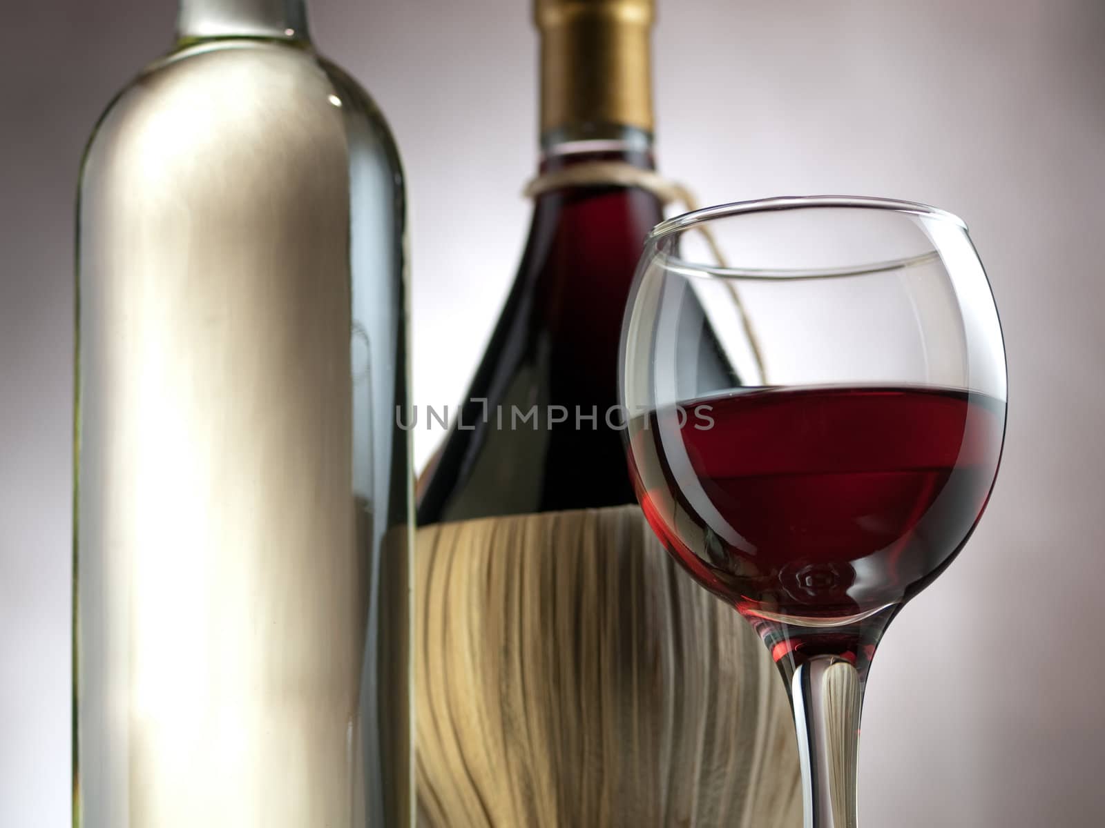 Red and white wine in elegant setting