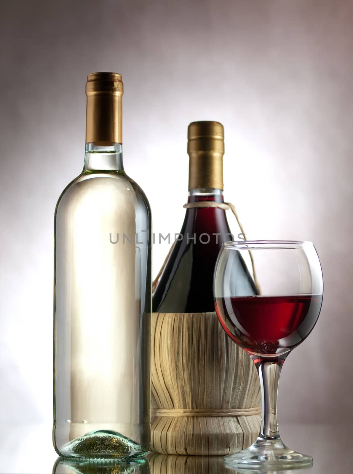 Red and white wine in elegant setting