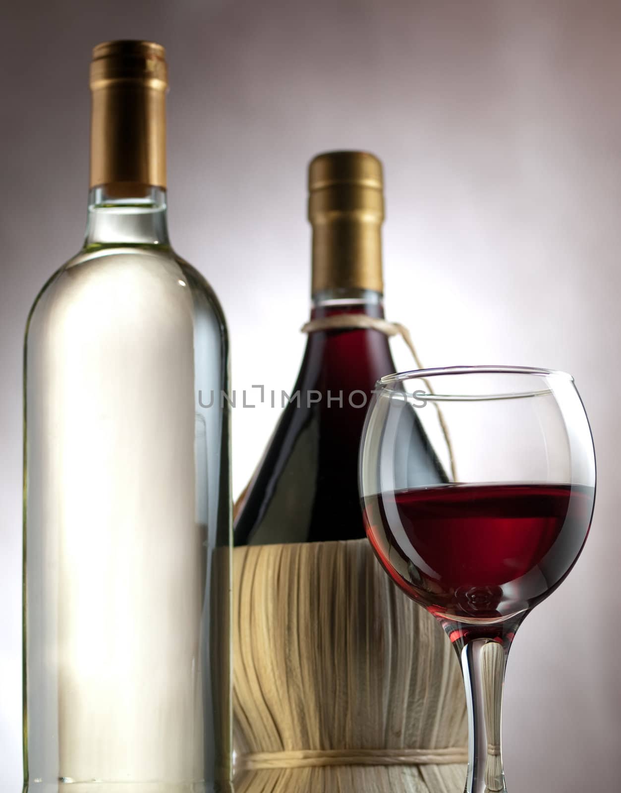 Red and white wine in elegant setting