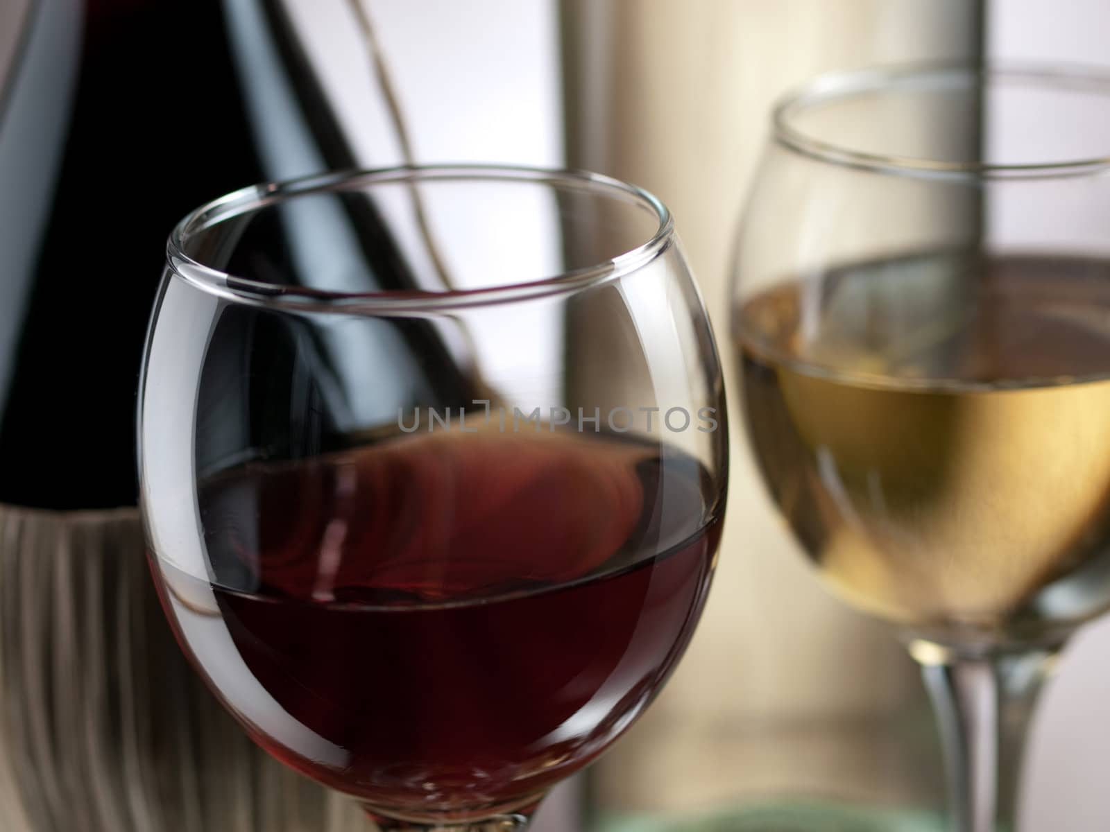 Red and white wine in elegant setting